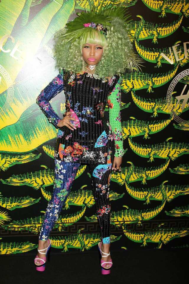 Minaj wears a Versace-esque colorful print.