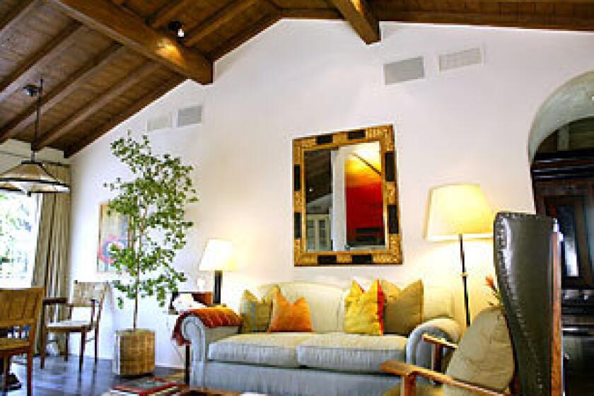 Acting couple Ben Affleck and Jennifer Garner are the latest owners of a California ranch house in the Pacific Palisades that has been capturing the imagination of A-listers since Gregory Peck bought it in 1947. This is the den in the 8,800-square-foot home they bought from producer Grazer for $17.55 million, according to public records.