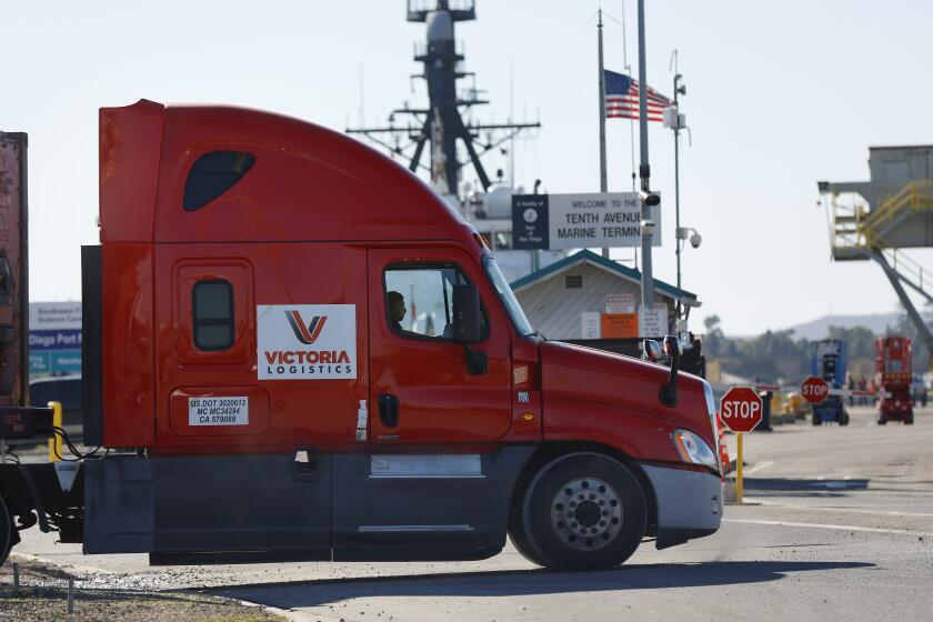 San Diego, CA - February 1: A big rig pulls into the 10th Avenue Marine Terminal in Barrio Logan on Wednesday, February 1, 2023. A deal between the Port of San Diego and Mitsubishi Cement Corp. for a storage facility at the 10th Avenue Marine Terminal has fallen through, officials announced Wednesday. (K.C. Alfred / The San Diego Union-Tribune)