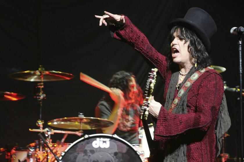 LOS ANGELES, CA - JULY 31: Tom Keifer of the Cinderella performs At The Nokia Theatre At L.A. Live on July 31, 2010 in Los Angeles, California. (Photo by Frazer Harrison/Getty Images) ORG XMIT: 103055961 ** TCN OUT ** ORG XMIT: ORL1008010439402142