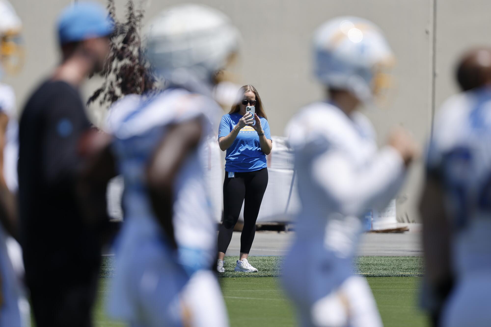 Meet the Chargers content material crew successful the schedule launch 'Tremendous Bowl' 2 Allie Raymond records players and coaches taking part in Chargers rookie minicamp on May 9.