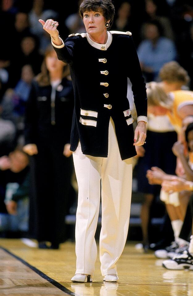 Pat Summitt signals from the sidelines in 1997 during the NCAA Midwest Regional Final game against the UConn Huskies at the Carver-Hawkeye Arena in Iowa City, Iowa. The Volunteers defeated the Huskies 91-81.