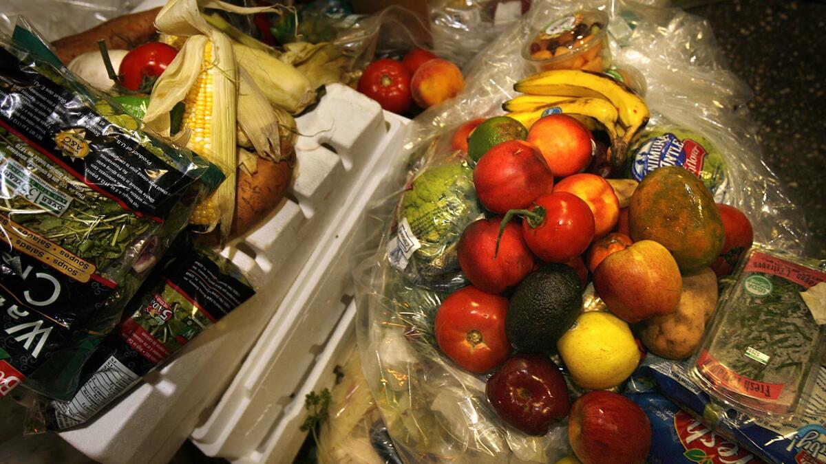 Food recovered from trash bins in New York City. Experts say the food wasted by Americans could provide 190 million adults with 2,000 calories every day.