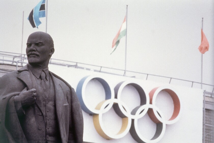 FILE - In this July 1980, a statue of Lenin sits outside of Lenin Stadium, main stadium for the 1980 Summer Olympic Games in Moscow., (AP Photo/File)