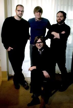 NEW DIRECTION: Though Ben Gibbard, sitting, and his bandmates insist they made no conscious attempt to challenge their fans' expectations, their upcoming album, "Narrow Stairs," represents something of a left turn for Death Cab: Where 2005's "Plans" emphasized the band's well-known knack for pretty, introspective indie pop, the new CD explores thornier, noisier territory. Read the story: A sharp turn for Death Cab for Cutie