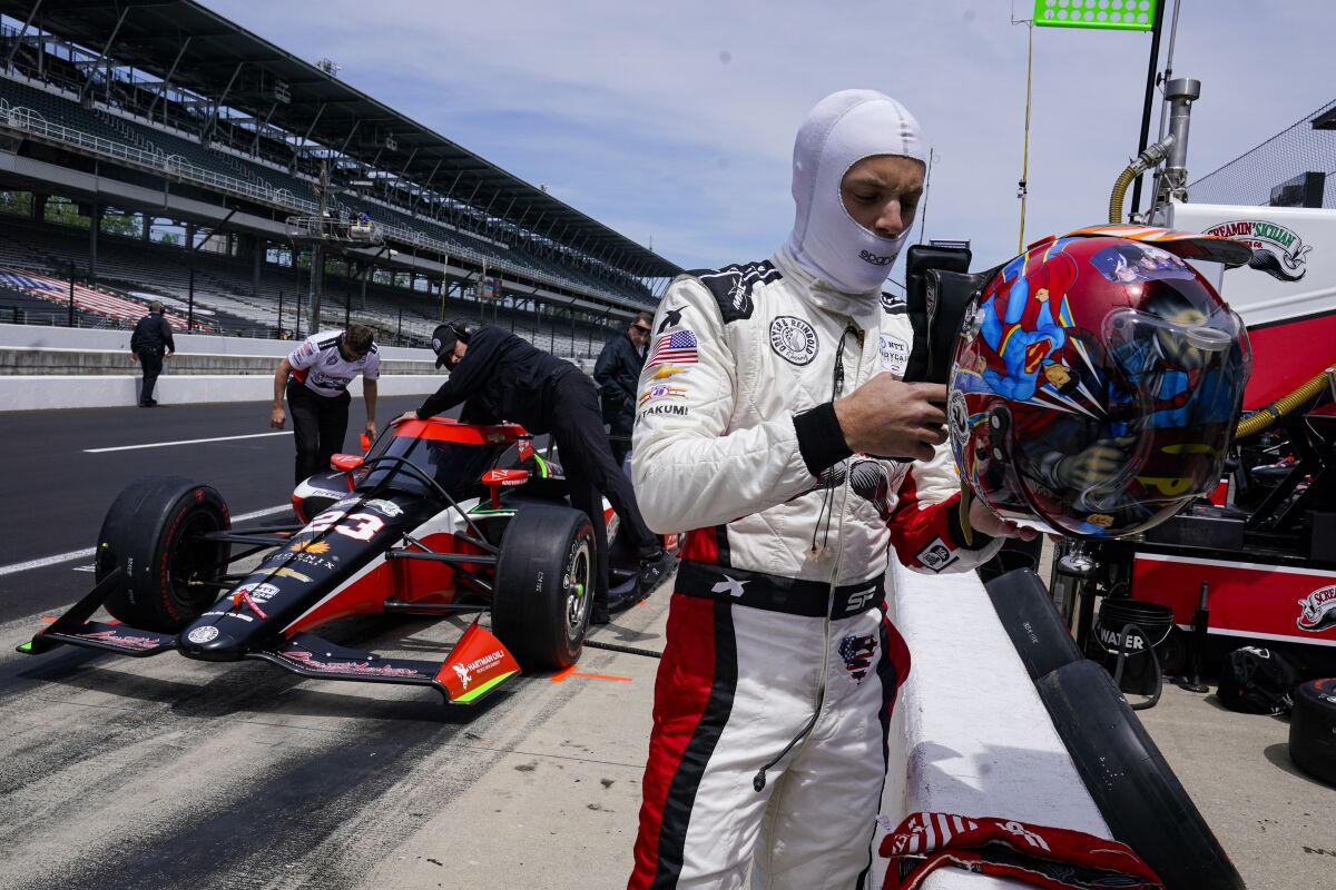 Santino Ferrucci prepares to drive before the start of practice for the Indianapolis 500 auto race at Indianapolis Motor Speedway in Indianapolis, Monday, May 23, 2022. (AP Photo/Michael Conroy)