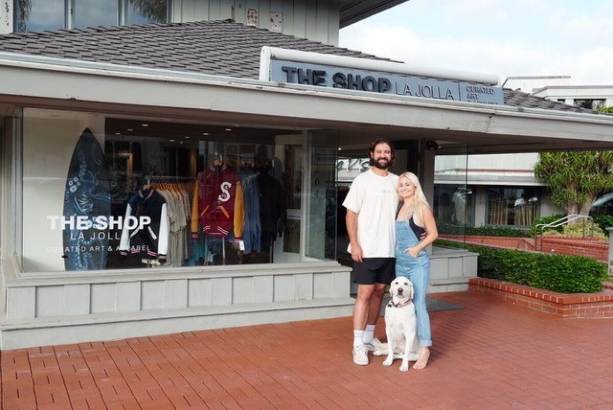 Nate Adams and Kalli Legakes (Silas pictured) own The Shop La Jolla, which opened on Prospect Street this summer.