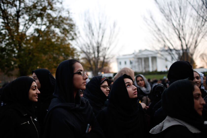 Shiite Muslims demonstrate for peace outside the White House on Sunday, before President Obama was scheduled to address the nation from the Oval Office.