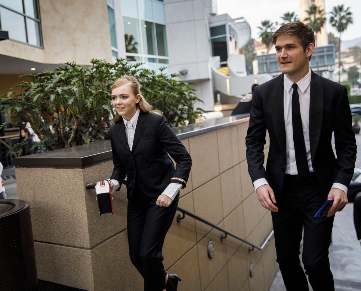 "Eighth Grade" actress Elsie Fisher and the film's writer and director, Bo Burnham, head to the Governors Awards.