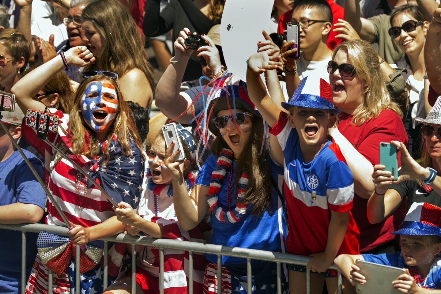 Picture takers were out in abundance for the parade honoring the World Cup championship U.S. women's soccer team.