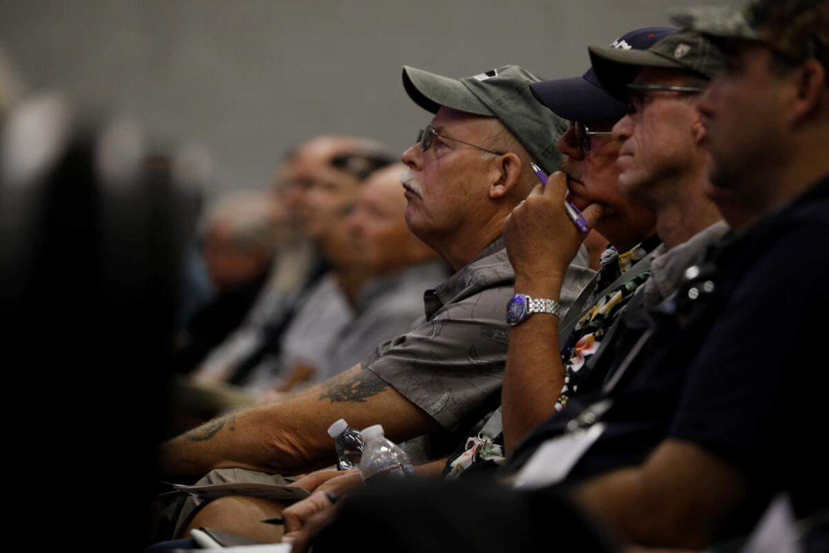 The audience listens as speakers discuss church security at a seminar sponsored by the California Rifle & Pistol Assn. at Mariners Church in Huntington Beach on Monday.