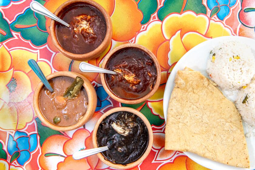 LOS ANGELES, CA - OCTOBER 21: 4 varieties of mole from Guelaguetza on Thursday, Oct. 21, 2021 in Los Angeles, CA. (Mariah Tauger / Los Angeles Times)