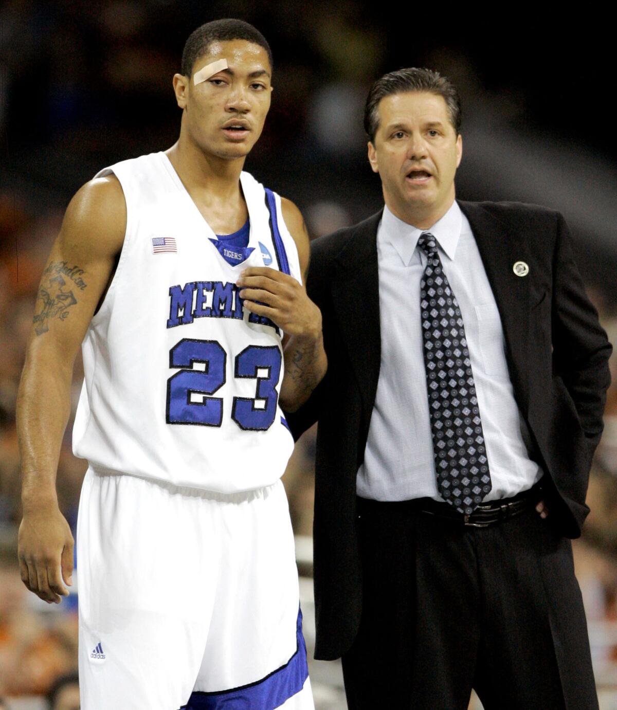 Memphis coach John Calipari talks with Derrick Rose during an NCAA tournament game in 2008. (Associated Press)