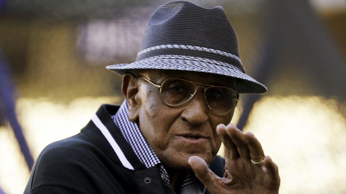 Don Newcombe watches batting practice before a game against Colorado in September 2018 at Dodger Stadium.