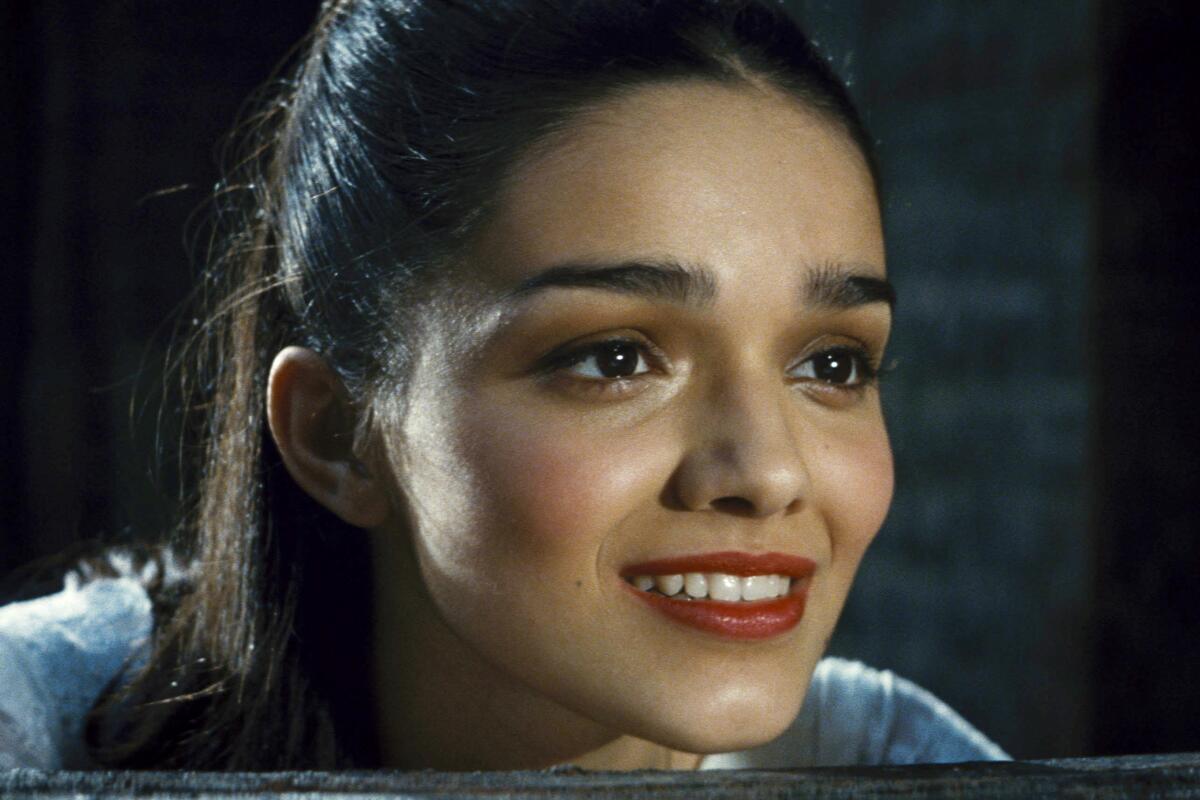 A close-up photo of a smiling young woman