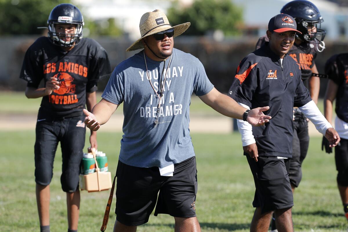 Los Amigos' Maopu Tuato, seen in a practice on Aug. 9, will make his Garden Grove League head-coaching debut on Thursday.