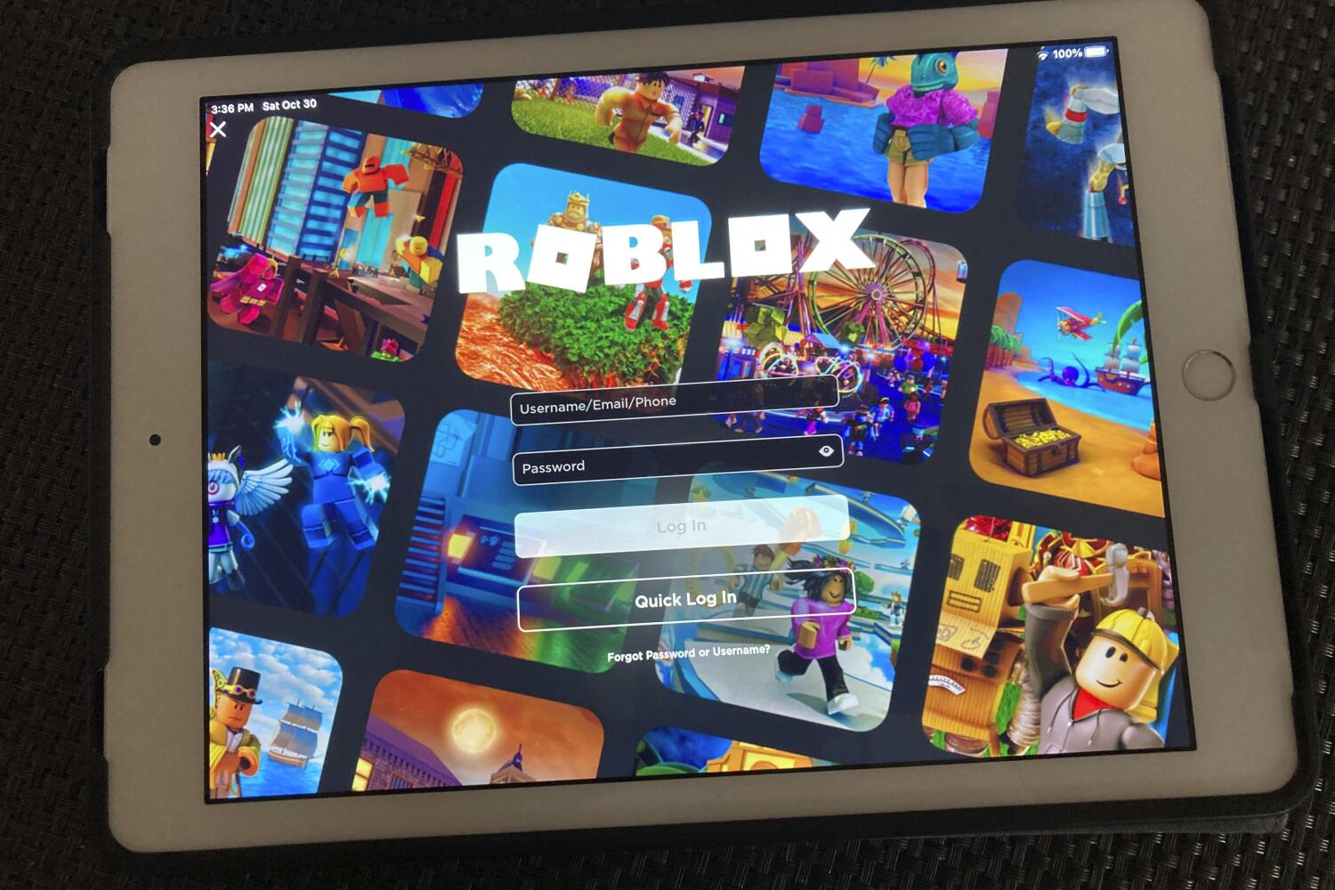FILE - The gaming platform Roblox is displayed on a tablet, Oct. 30, 2021, in New York. (AP Photo/Leon Keith, File)