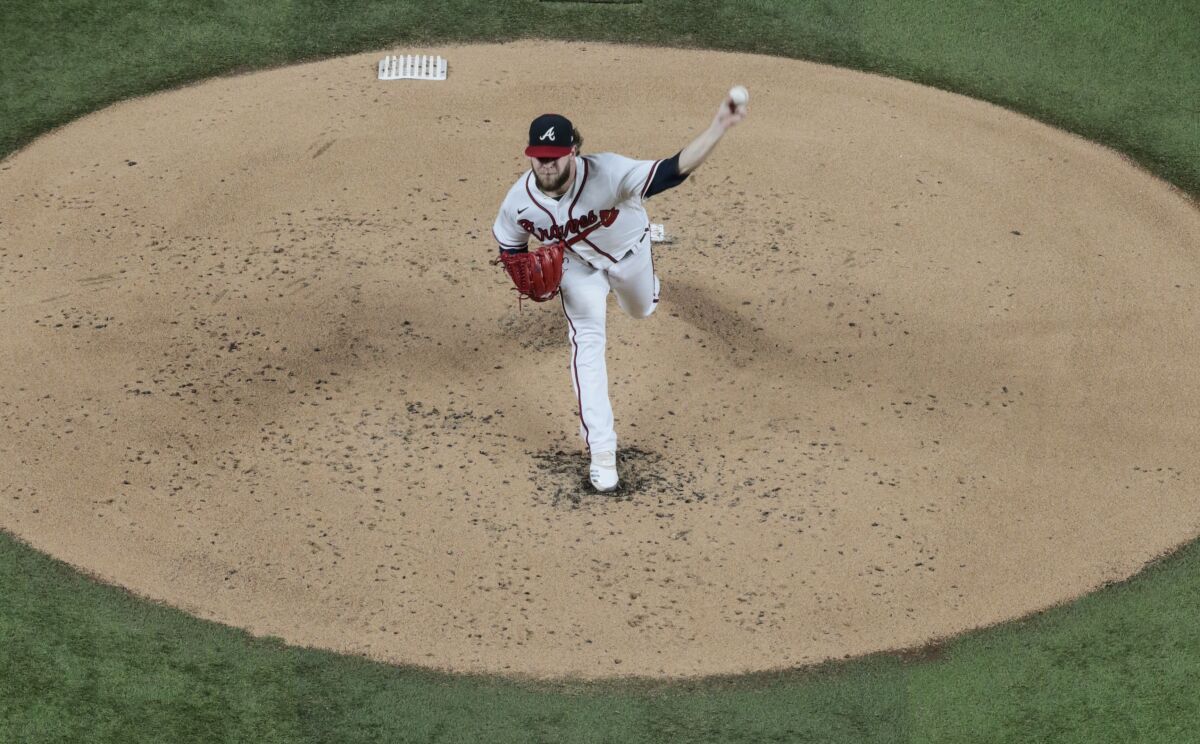 Atlanta Braves pitcher A.J. Minter delivers during the second inning of Game 5 of the NLCS against the Dodgers.