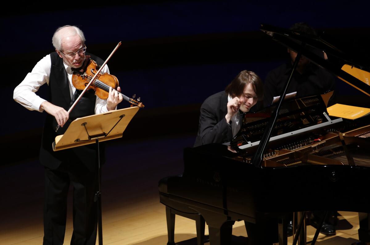 Violinist Gidon Kremer and pianist and Tchaikovsky Competition winner Daniil Trifonov perform at the Disney Concert Hall on Jan. 14, 2015.