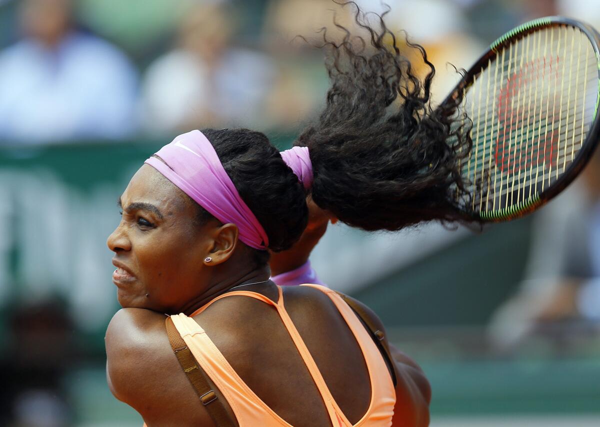 Serena Williams follows through on a backhand during her victory over Sara Errani in the quarterfinals of the French Open on Wednesday in Paris.