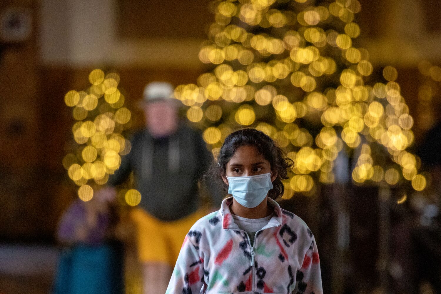 Health officials are urging masks again amid high COVID, flu levels