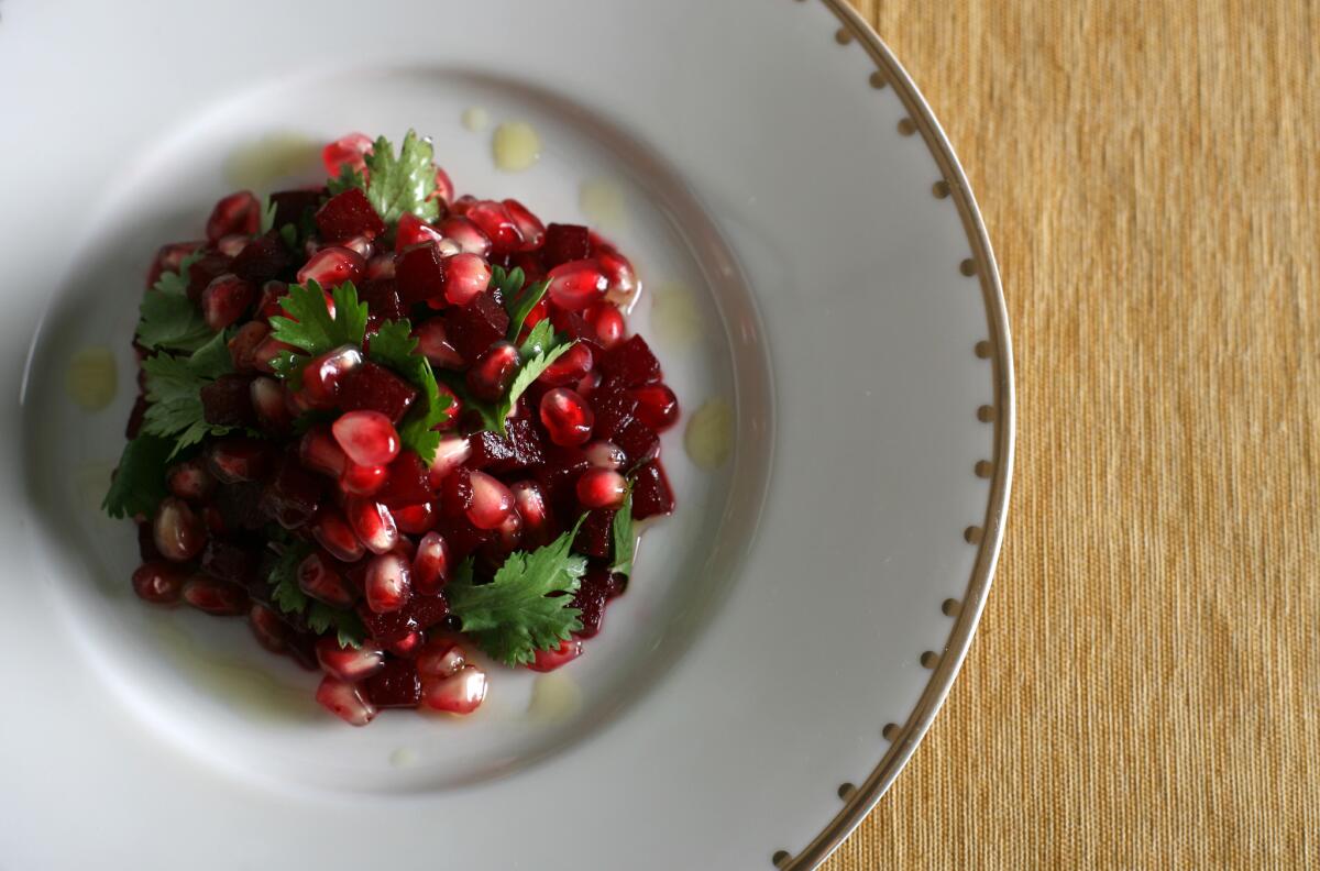 A beet-and-pomegranate salad is brought to life from "The Book of New Israeli Food," an inspiring gateway into present-day Israel. Recipe: Beet-and-pomegranate salad