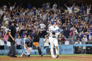 Los Angels, California August 23, 2024-Dodgers Shohei Ohtani hits grand slam in the bottom of the ninth inning to win the game against the Devil Rays at Dodger Stadium Friday. (Skalij/Los Angeles Times)