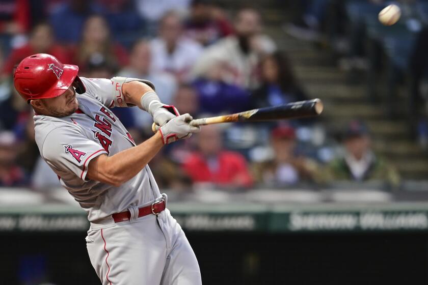 Los Angeles Angels pinch hitter Shohei Ohtani wears a jersey with his  nickname SHOWTIME on the back as he bats in the eighth inning during the  Major League Baseball game against the