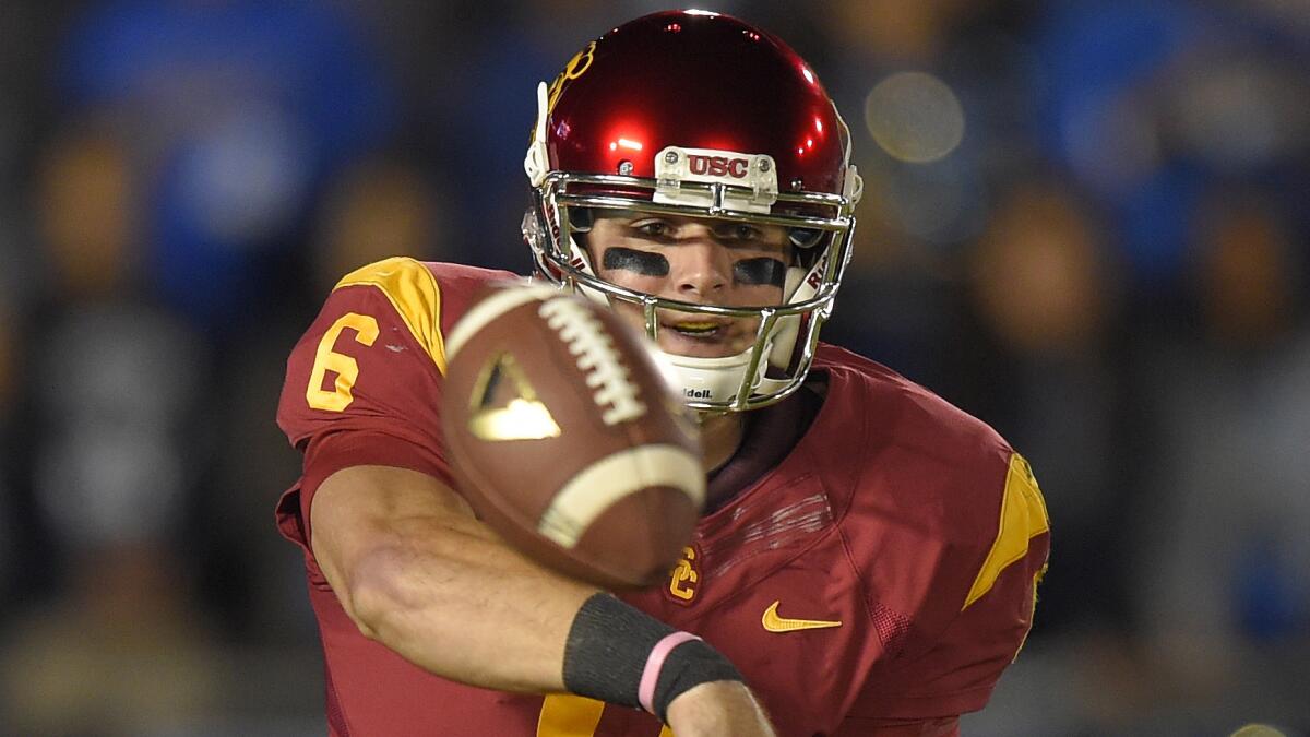 USC quarterback Cody Kessler throws a pass during a loss to UCLA on Nov. 22, 2014.