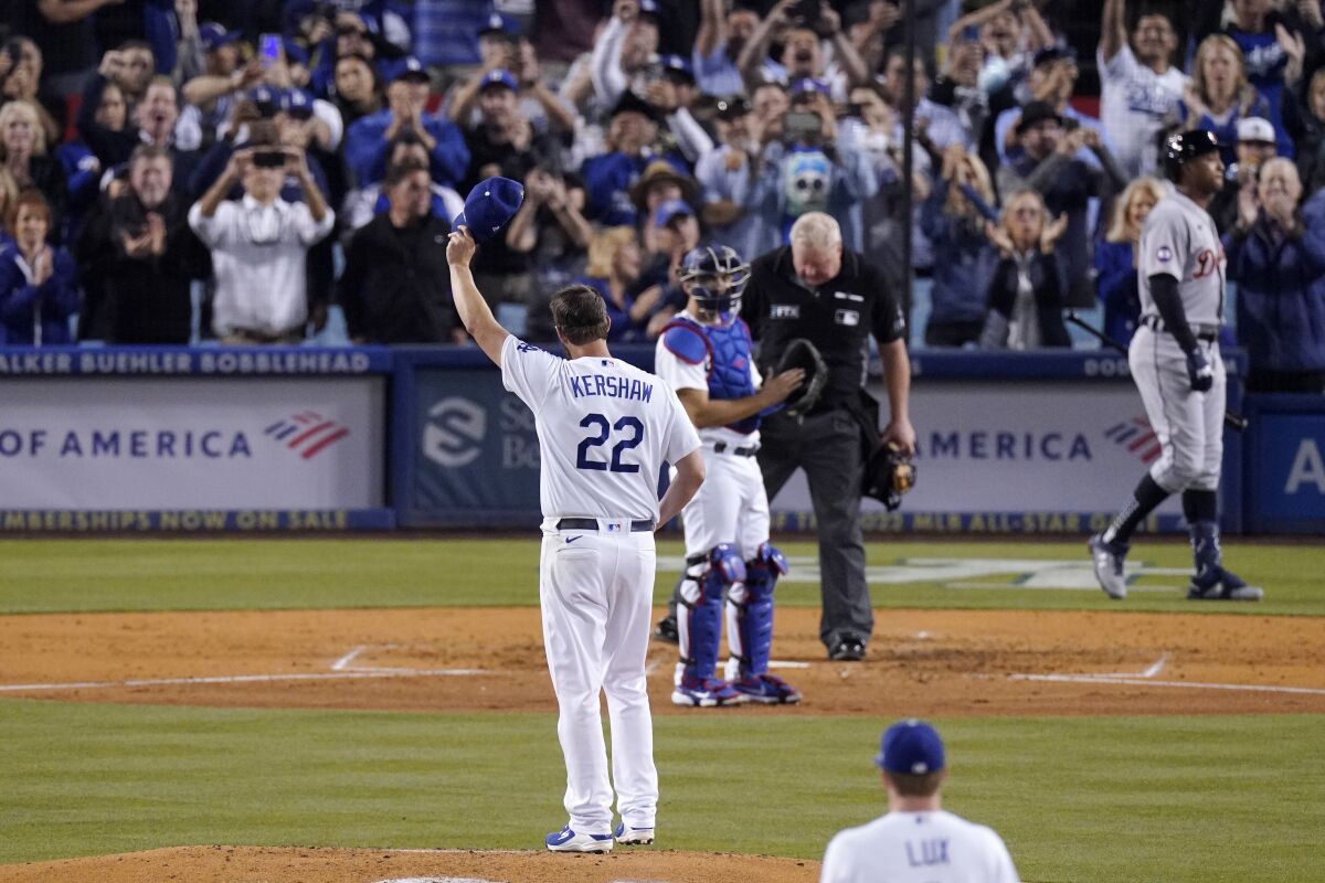 Clayton Kershaw tips his cap after striking out Detroit's Spencer Torkelson.