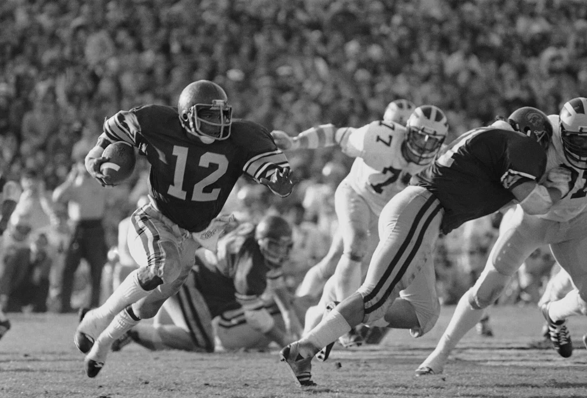 USC tailback Charles White grooves his way past the Michigan defense during the Rose Bowl game in Pasadena.