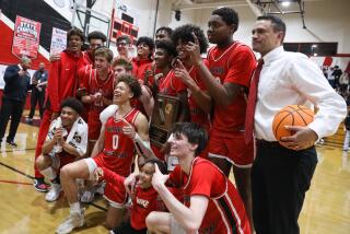 CORONA , CA - MARCH 07: Harvard-Westlake basketball team celebrate after winning the Southern California Open Division regional final against Corona Centennial 80-61 on Tuesday, March 7, 2023 in Corona, CA. (Jason Armond / Los Angeles Times)