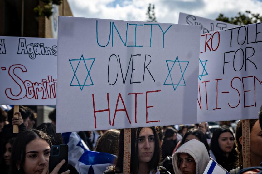 Woodland Hills, CA - February 27: Jewish students at El Camino Real High School walkout in response to recent antisemitic incidents at the school on Tuesday, Feb. 27, 2024 in Woodland Hills, CA. (Jason Armond / Los Angeles Times)