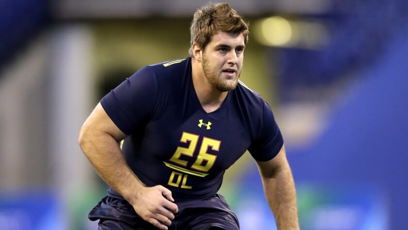 Offensive lineman Forrest Lamp, shown running a drill at the NFL combine on March 3, was the Chargers' priority during the second round of the draft.