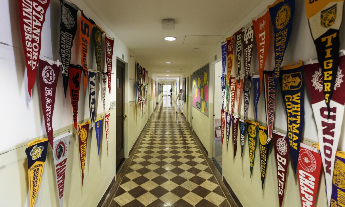 College pennants line the hallway at the Archer School for Girls in Brentwood.