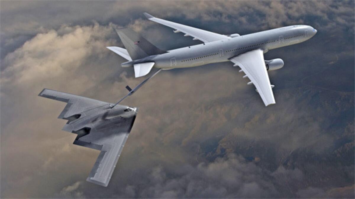 This aritst rendering shows a KC-45A refueling a B-2 stealth bomber. The company's tanker won in the areas of capability, price, aerial refueling assessment and past performance.