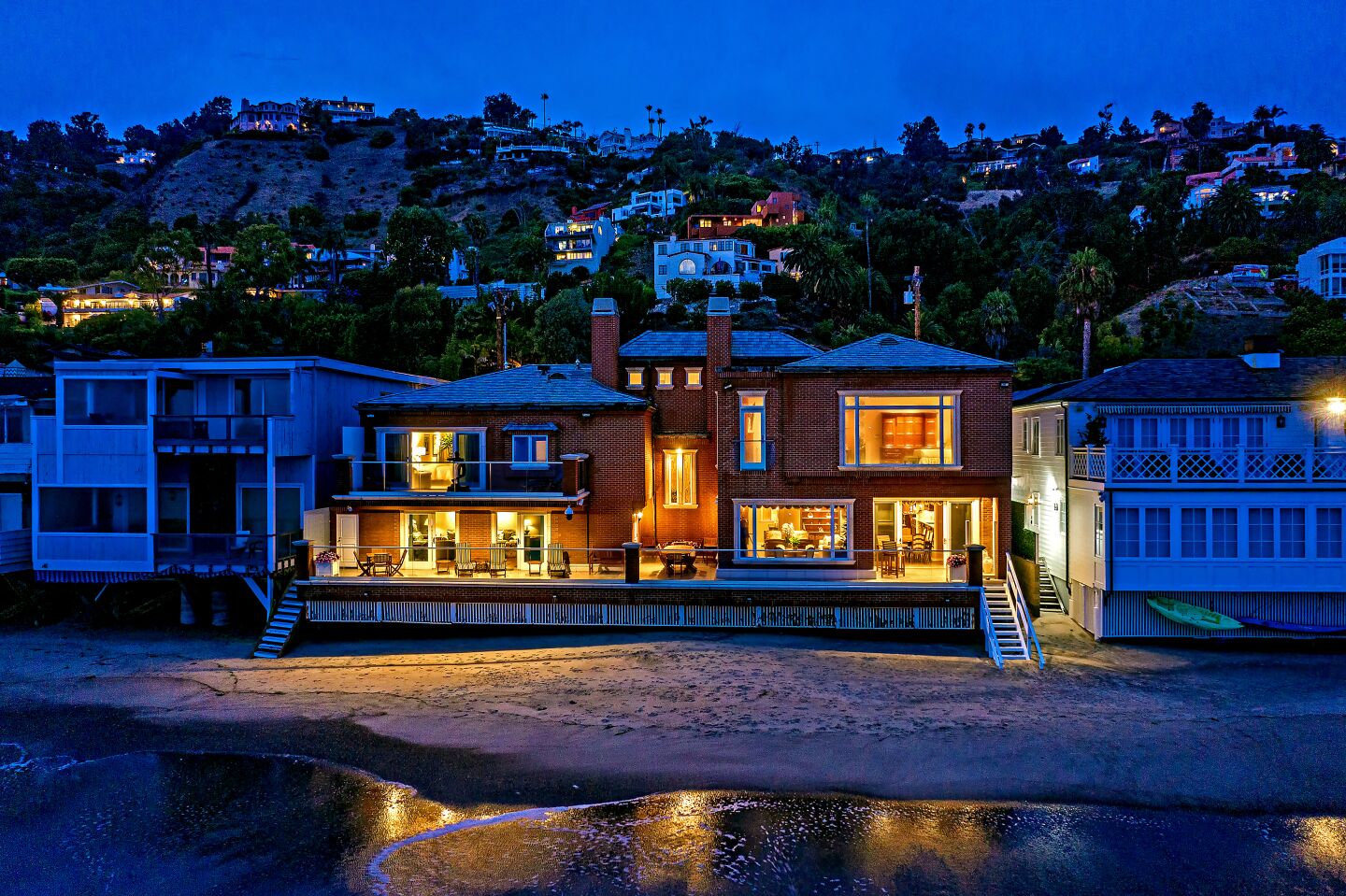 Socialite Candy Spelling has listed her oceanfront home in Malibu for sale at $23 million. The brick-clad residence sits on 81 feet of beach frontage on La Costa Beach.