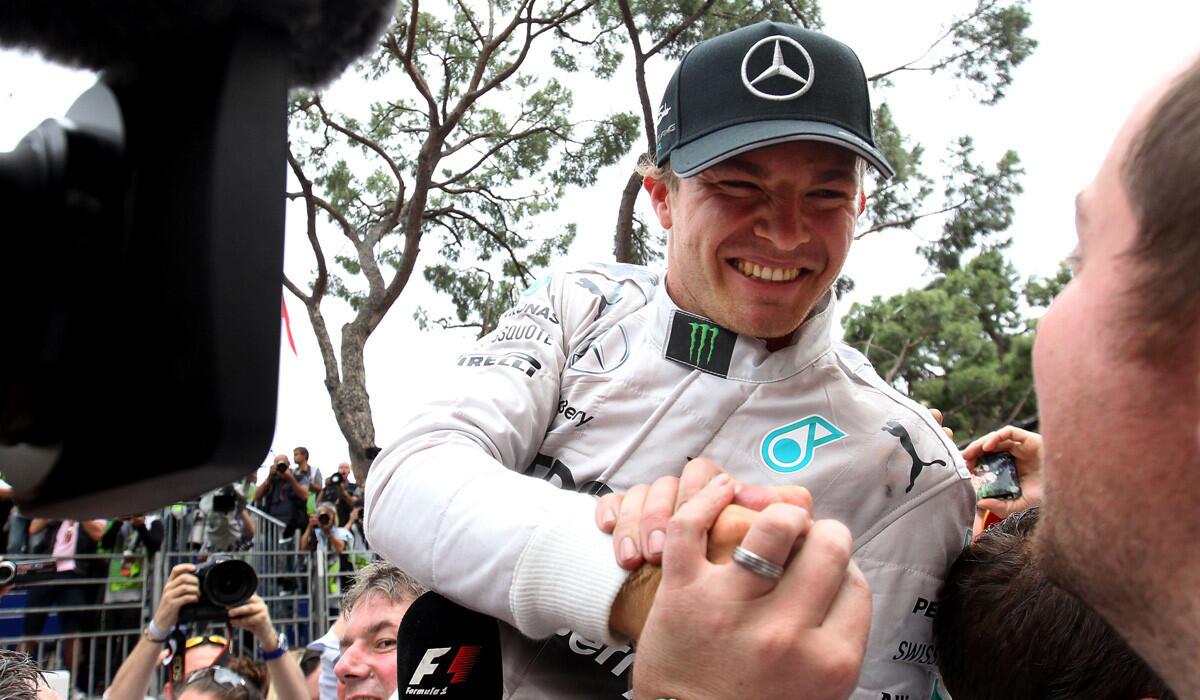 Formula One driver Nico Rosberg is congratulated after winning the Monaco Grand Prix on Sunday.