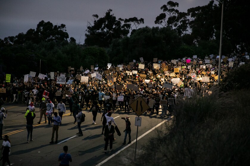 Thousands of protestors march down Pershing Drive toward downtown San Diego on June 4, 2020 in San Diego, California.
