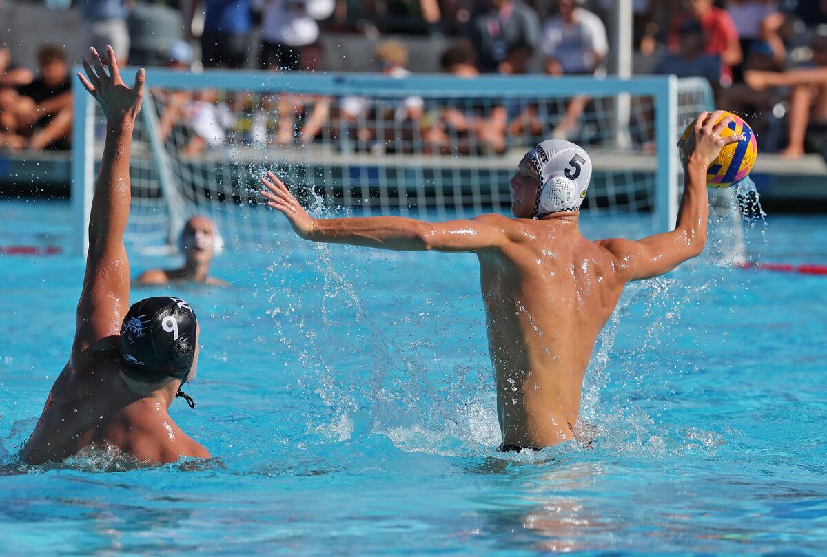 Sean Anderson (5) of Newport Beach Water Polo Club takes a long shot with time winding down against North Irvine on Tuesday.