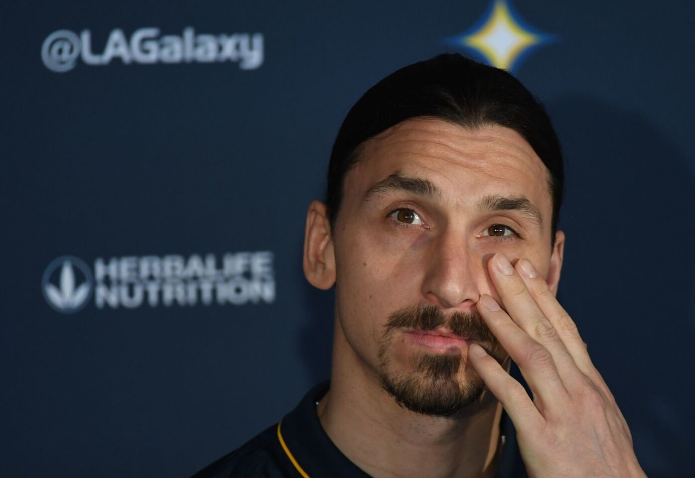 LA Galaxy footballer Zlatan Ibrahimovic gestures during his first press conference for the club in Los Angeles, California, on March 30, 2018. The 36-year-old Swedish striker's move to MLS from Manchester United was confirmed last week, with Ibrahimovic swiftly vowing to reignite the Galaxy's fortunes after they finished bottom of the league last season. / AFP PHOTO / Mark RalstonMARK RALSTON/AFP/Getty Images ** OUTS - ELSENT, FPG, CM - OUTS * NM, PH, VA if sourced by CT, LA or MoD **
