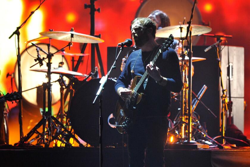 Caleb Followill of Kings of Leon, shown during the 2013 MTV EMA's in Amsterdam, Netherlands, are part of lineup at KROQ Annual Acoustic Christmas for which VIP tickets are being auctioned to benefit Red Cross Disaster Relief efforts in the Philippine.