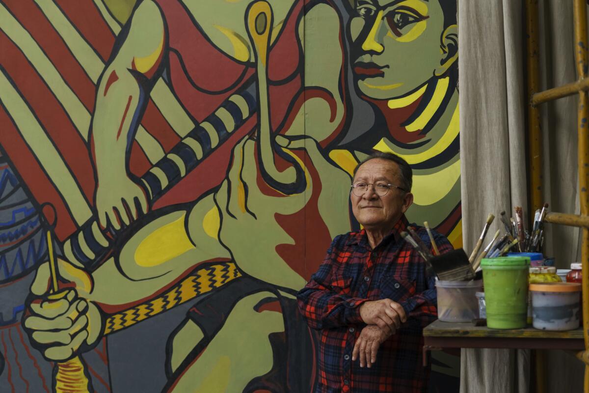 Muralist Ariosto Otero joined the fight to help save the murals of the Centro SCOP.