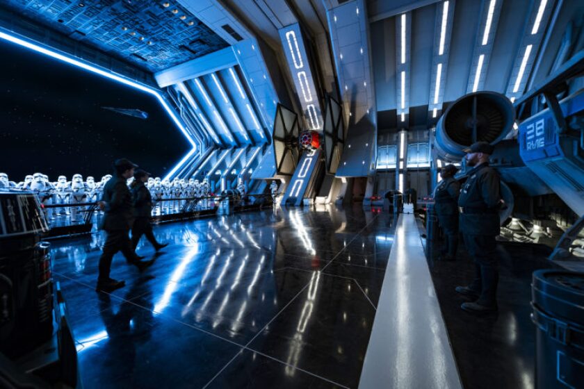 First Order troops and stormtroopers patrol the hangar bay of a Star Destroyer in Star Wars: Rise of the Resistance, the groundbreaking new attraction opening Jan. 17, inside Star Wars: Galaxy’s Edge at Disney’s Hollywood Studios in Florida and Jan. 17, 2020, at Disneyland Park in California. Guests enter the hangar bay after their ship is caught in the Star Destroyer’s tractor beam in this thrilling new Disney experience.
