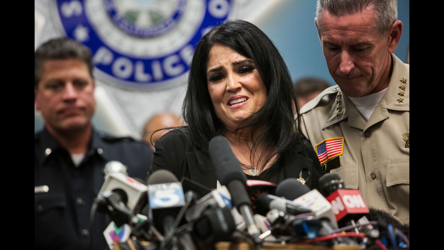 Speaking during a Dec. 8 news conference, dispatcher Michelle Rodriguez of the San Bernardino County Sheriff's Department becomes emotional as she recounts the events of the deadly San Bernardino attack.