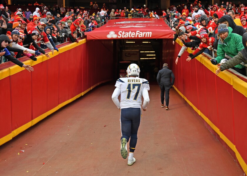 Philip Rivers of the Los Angeles Chargers runs up the tunnel after Sunday's 31-21 loss to the Kansas City Chiefs at Arrowhead Stadium.