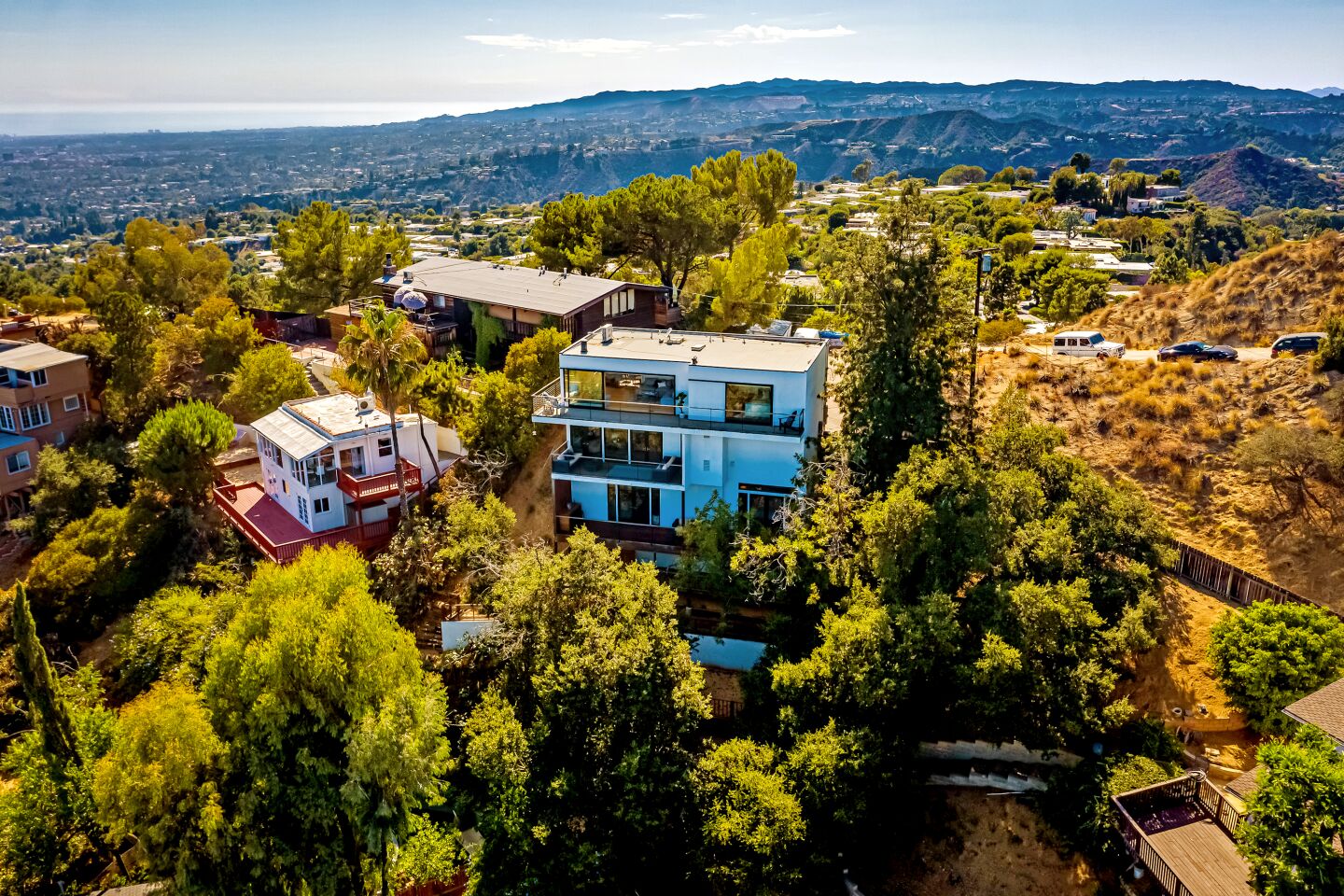 The Laurel Canyon home of KISS rocker Gene Simmons, listed for $2.2 million, takes in sweeping views from three levels of decking.