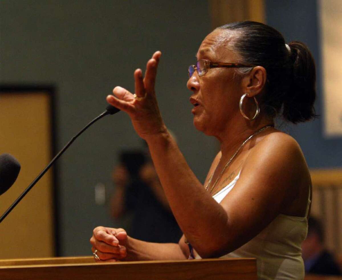 Theresa Smith, whose son Caesar Cruz was killed by Anaheim police in 2009, speaks to Anaheim City Council members at a meeting in 2012.