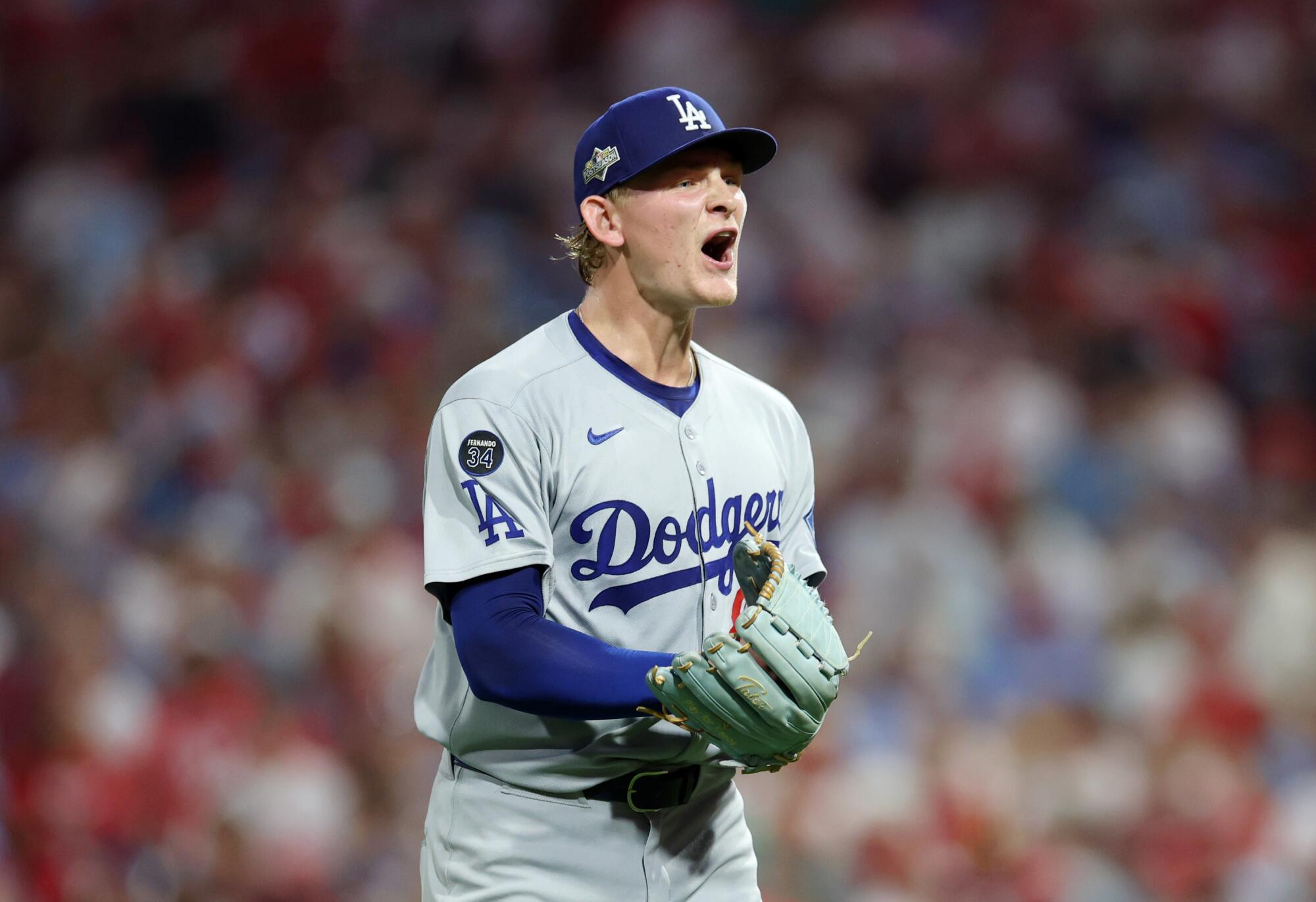 Emmet Sheehan reacts after closing the eighth round against the Phillies in match 2.