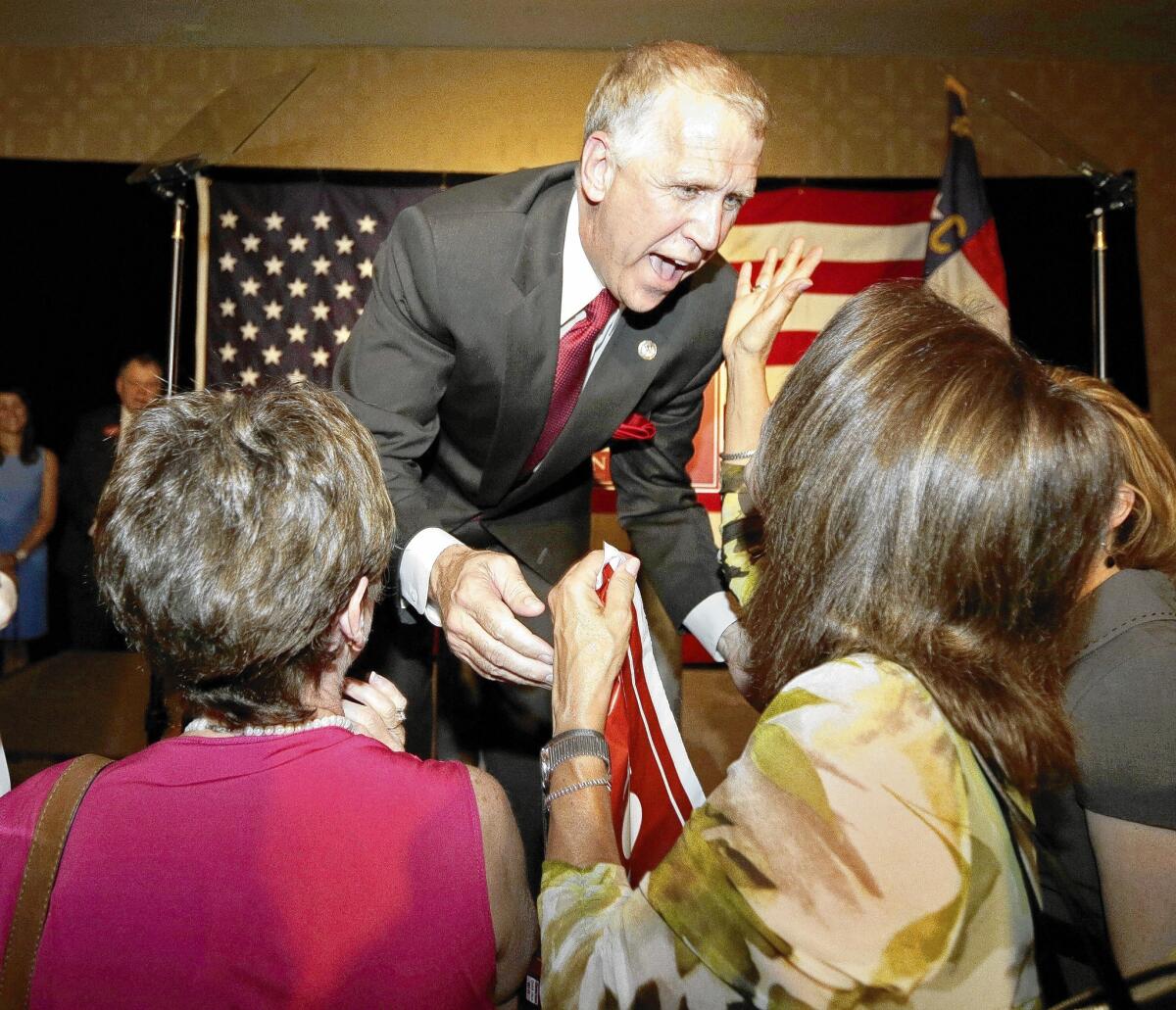 Thom Tillis greets supporters Tuesday after winning the GOP nomination to challenge North Carolina Sen. Kay Hagan.